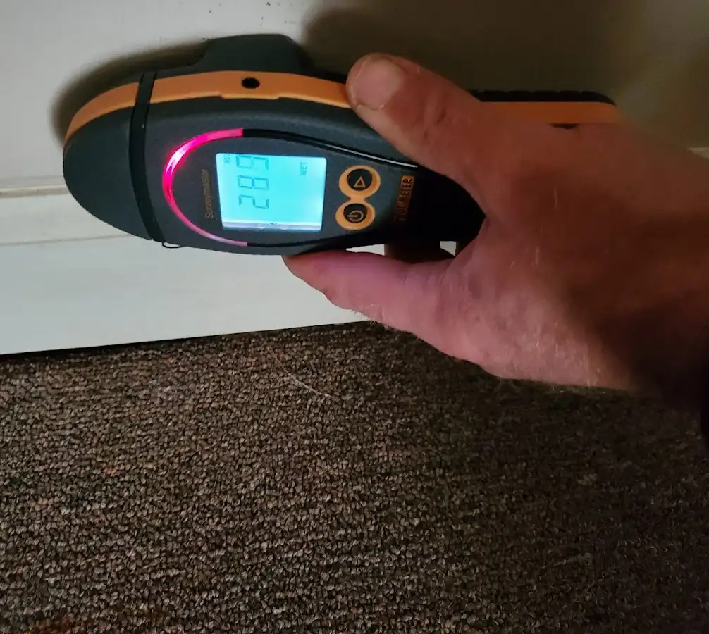 Moisture detection at baseboard during Storm Damage Restoration in Hesperia